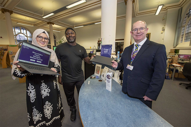 City of Wolverhampton Council’s Cabinet Member for Digital and Community Councillor Obaida Ahmed with Winston Lindsay of Ark Training, and Senior Librarian (Digital) David Potts.